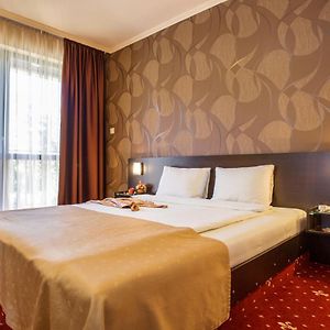 Suite met een Queen Size Bed